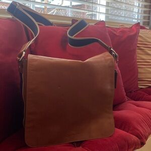 Coach bag. Camel color with blue strap.